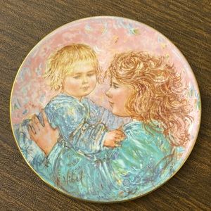 Edna Hibel collectible plate series of mother and child
